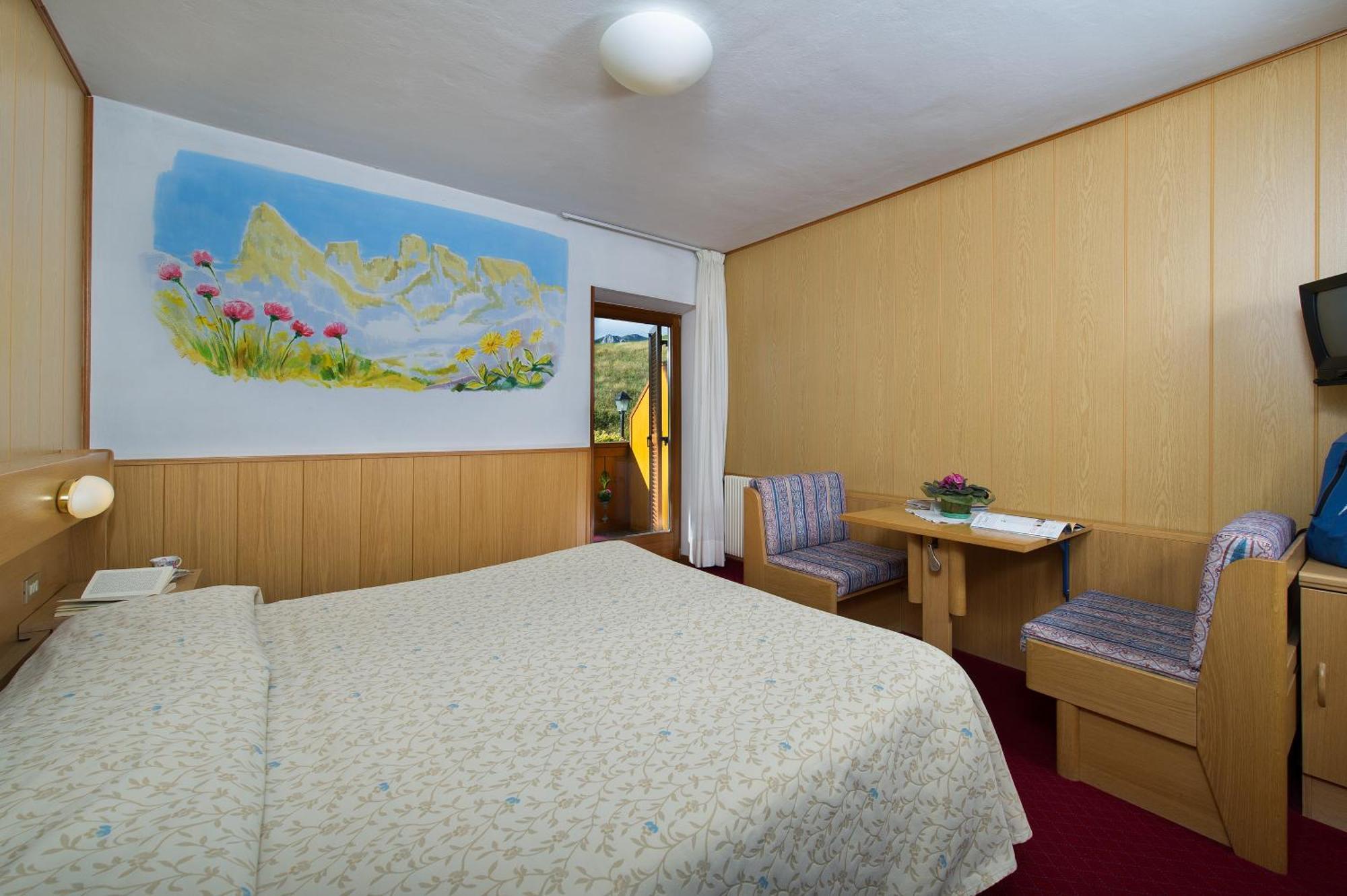 Hotel Gran Mugon Vigo di Fassa Pokoj fotografie